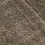 Warm taupe engineered stone wall panel or vanity countertop with natural stone-inspired veining, featured in a custom shower surround by The Bath Authority.