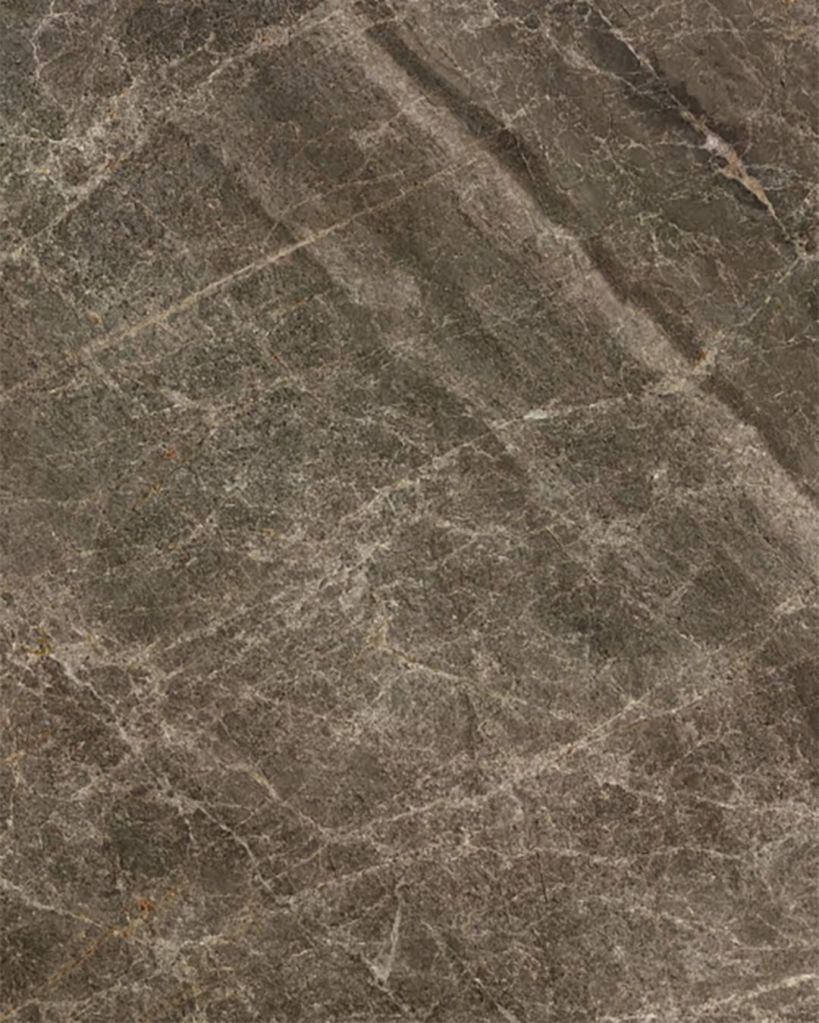 Warm taupe engineered stone wall panel or vanity countertop with natural stone-inspired veining, featured in a custom shower surround by The Bath Authority.