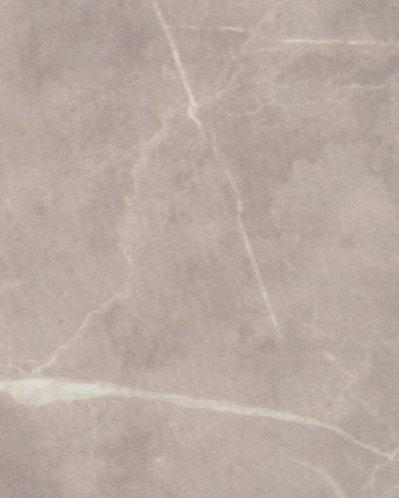 Light beige engineered stone shower wall panel or vanity countertop with subtle marble veining, installed by The Bath Authority for a warm and sophisticated bathroom aesthetic.